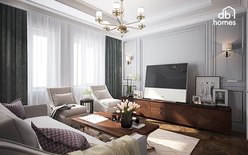 Phòng ngủ bố trí giường ngủ cổ điển với đầu giường uốn lượn, kết hợp tủ gỗ tự nhiên, tranh vẽ và đèn ngủ tạo không gian sang trọng