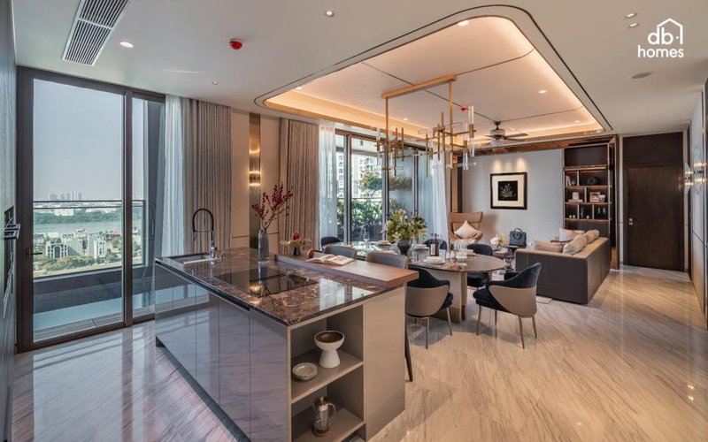 Không gian phòng khách và bếp được bố trí mở, giúp kết nối các thành viên và tạo cảm giác rộng thoáng