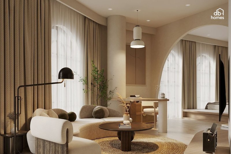 Thiết kế nội thất phòng khách đẹp phong cách Wabi Sabi với nội thất thô mộc và ánh sáng mềm mại, tạo không gian sống giản dị và ấm cúng