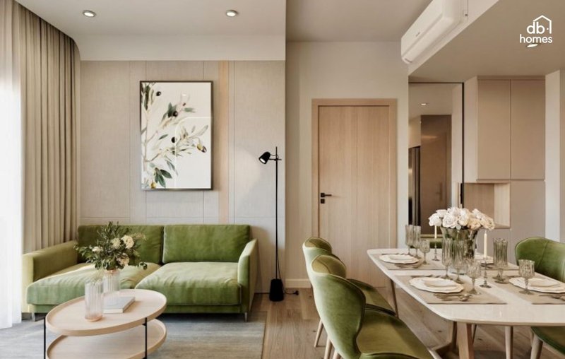 Phòng khách căn hộ với thiết kế nội thất xanh, sofa màu lá cây và không gian sáng tạo sự gần gũi với thiên nhiên