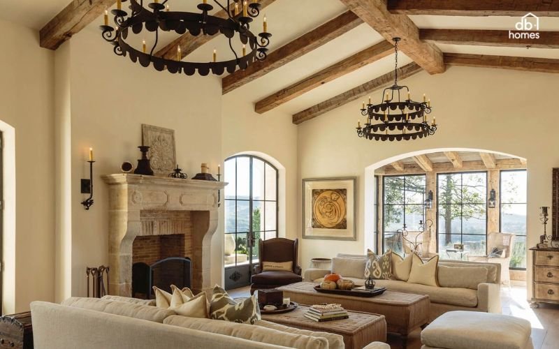 Phòng khách được thiết kế theo phong cách Địa Trung Hải với gam màu tươi sáng, nội thất mộc mạc và đường nét uốn lượn mềm mại